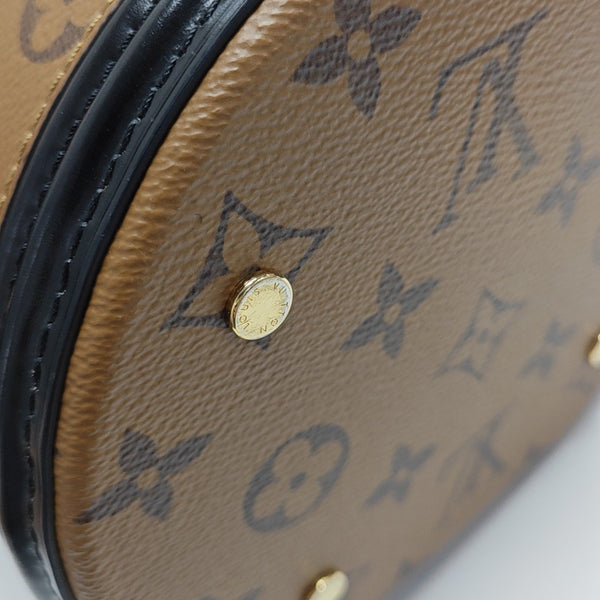 CANNES PM Monogram Coated Canvas Brown