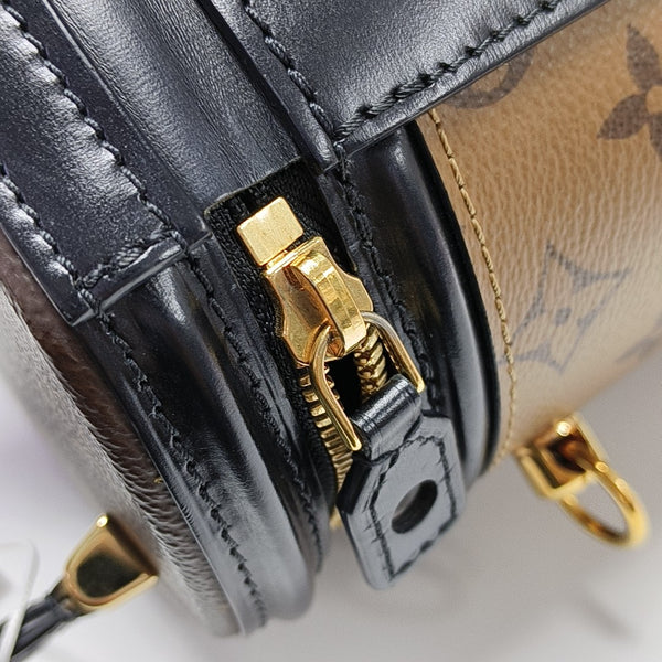 CANNES PM Monogram Coated Canvas Brown