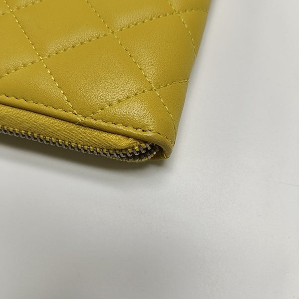 Authenticated pre-owned  WOC Quilted Lambskin Yellow Wallet - Wallet at Looply