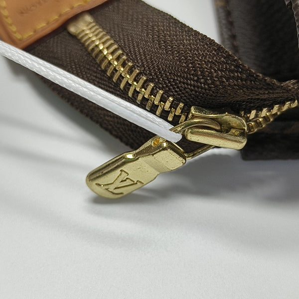 TOILET POCKET 26 Monogram Coated Canvas Brown