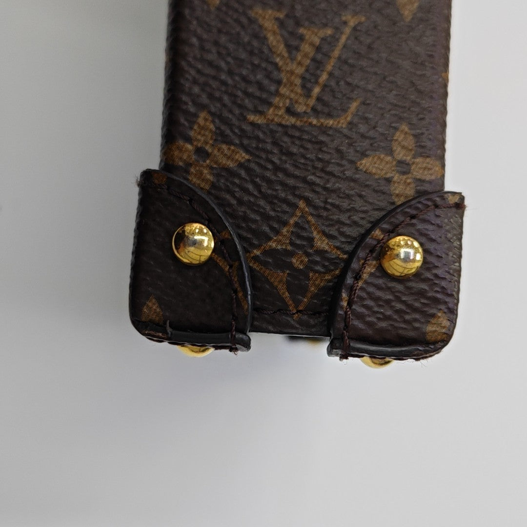 TRUNK Monogram Coated Canvas Brown