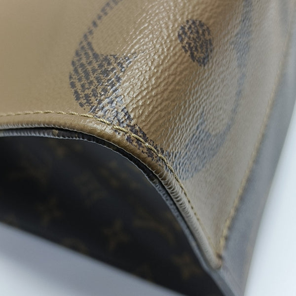 ONTHEGO MM Monogram Coated Canvas Brown