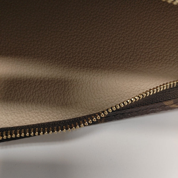 TOILET POCKET 26 Monogram Coated Canvas Brown