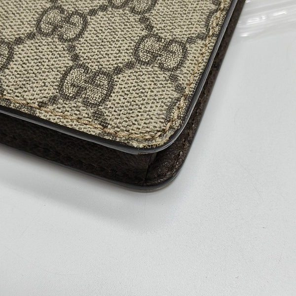 Monogram Coated Canvas Clutch Beige