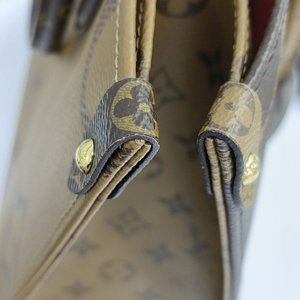 ONTHEGO MM Monogram Coated Canvas Brown