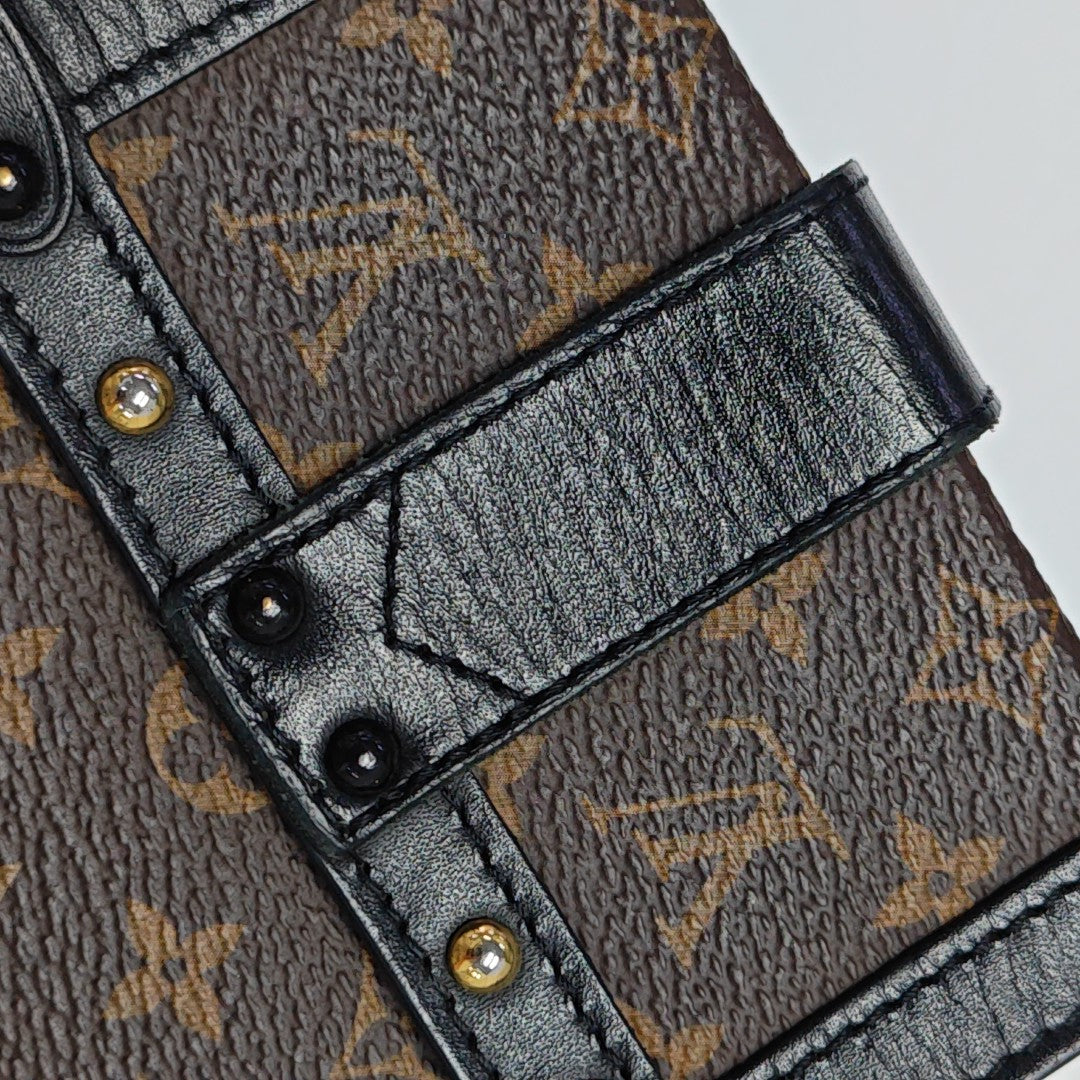 TRUNK Monogram Coated Canvas Brown