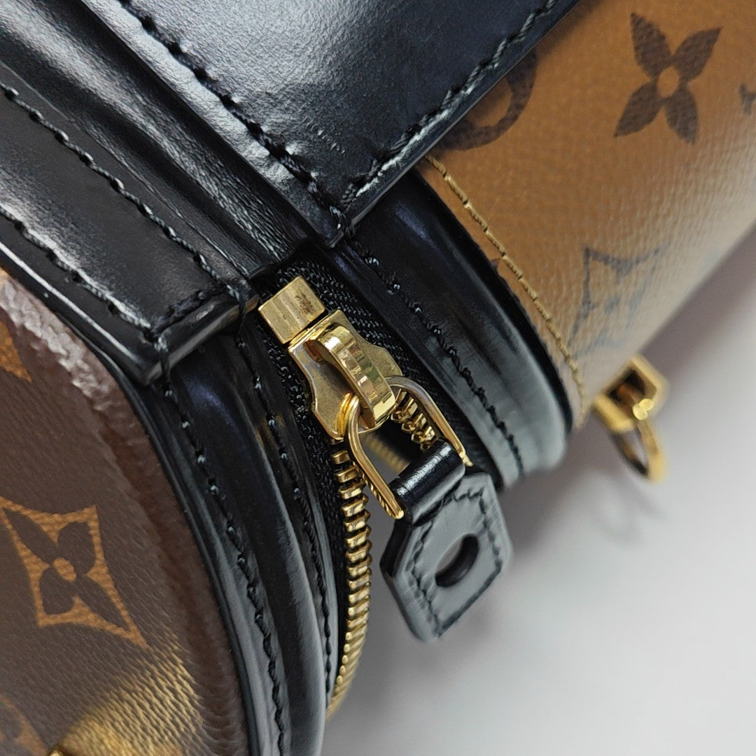 CANNES PM Monogram Coated Canvas Brown