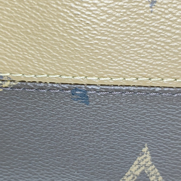 ONTHEGO MM Monogram Coated Canvas Brown