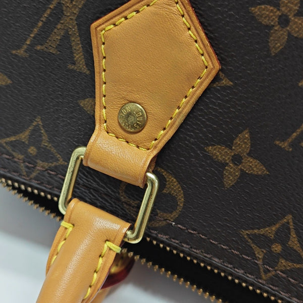 SPEEDY 25 Monogram Coated Canvas Brown