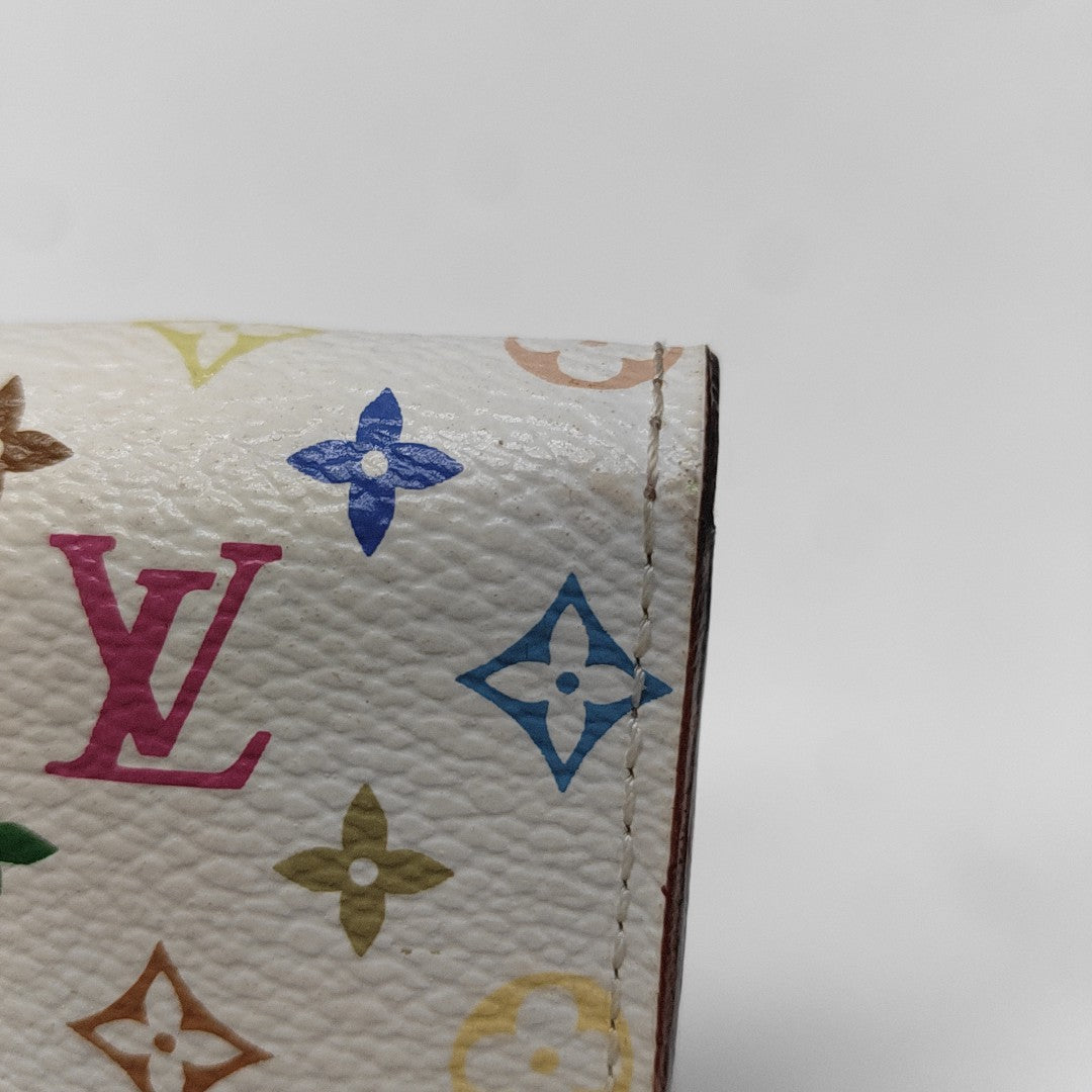 LV × TM INSOLITE Monogram Coated Canvas White
