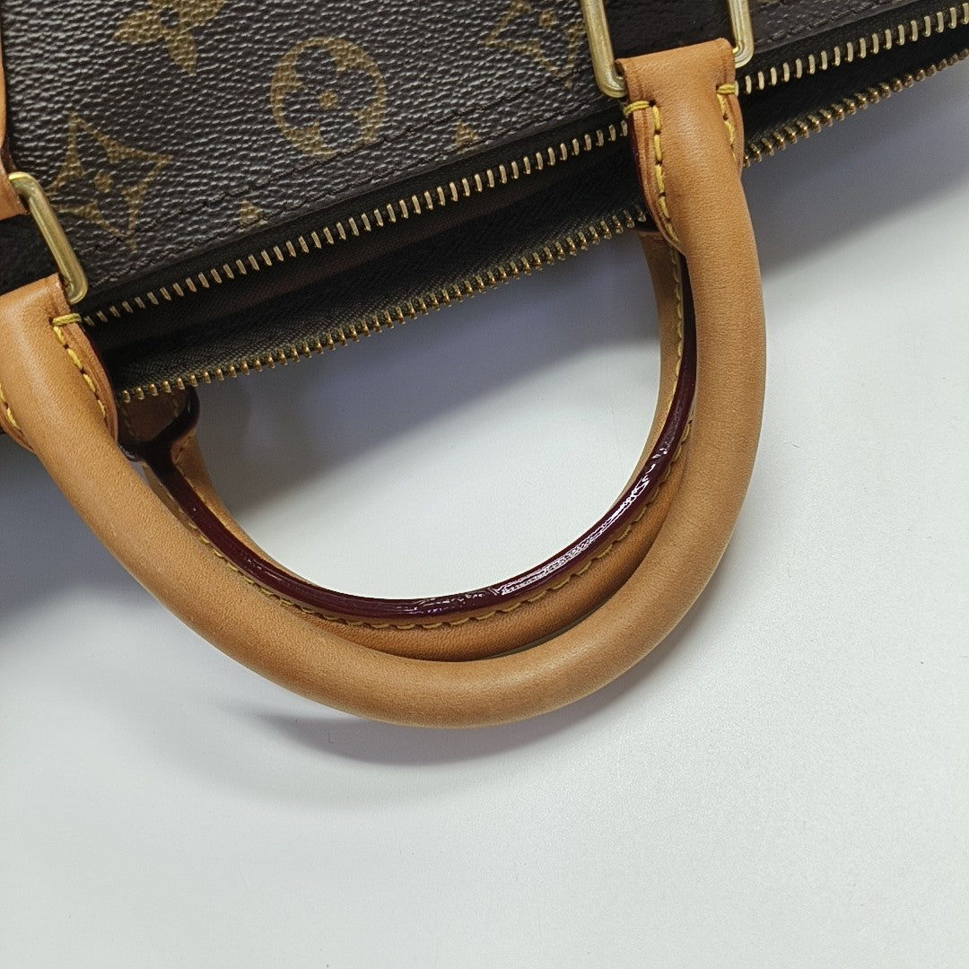 SPEEDY 30 Monogram Coated Canvas Brown
