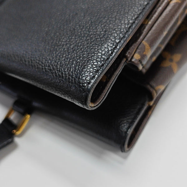 VÉNUS Monogram Coated Canvas Brown