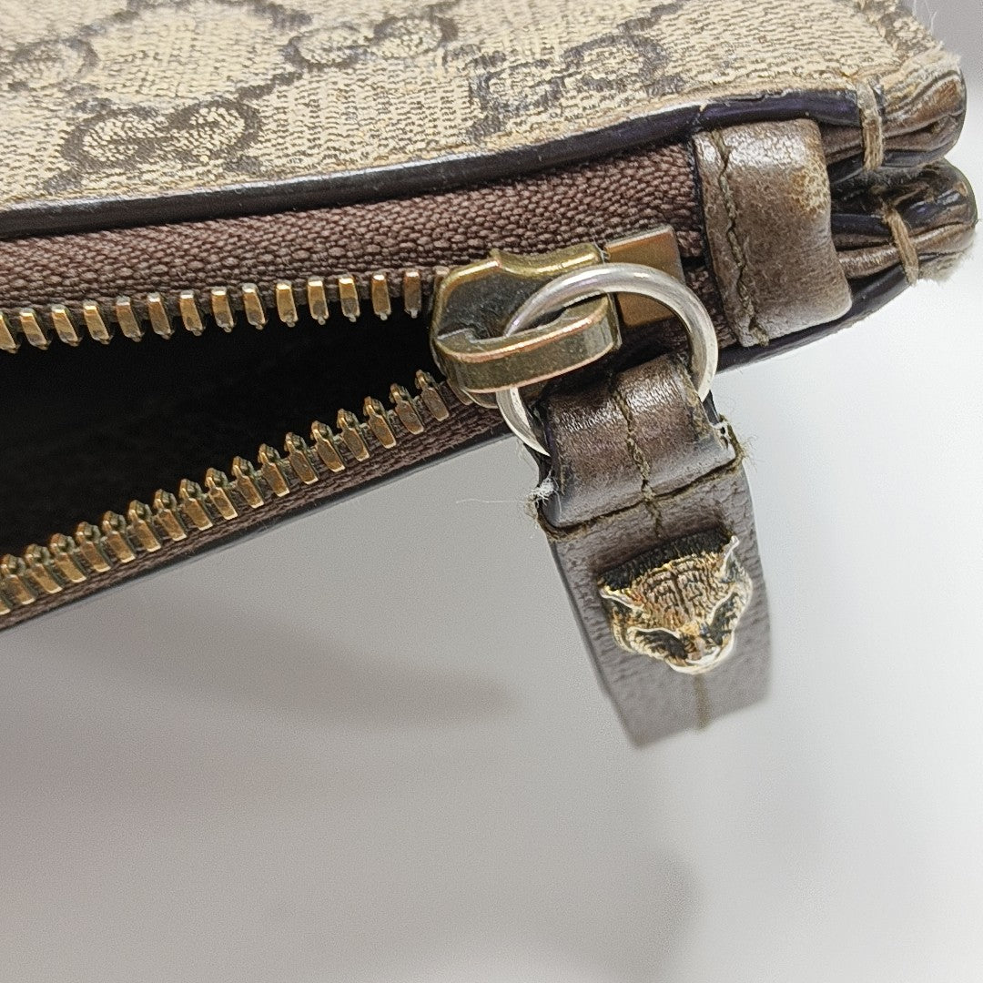 GG Supreme Monogram Coated Canvas Brown