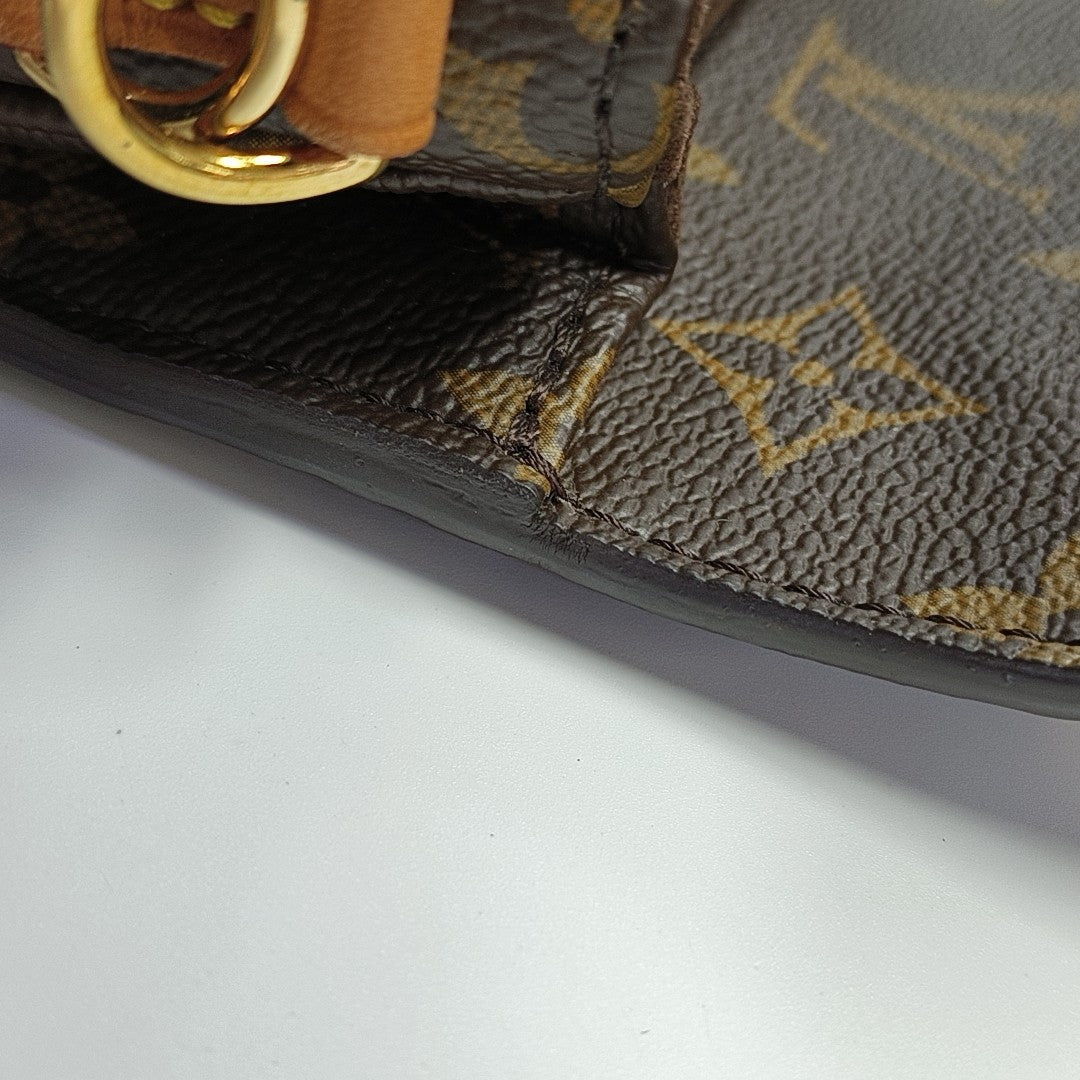 MÉTIS EAST WEST Monogram Coated Canvas Brown