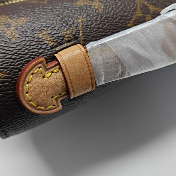 MÉTIS MM Monogram Coated Canvas Brown
