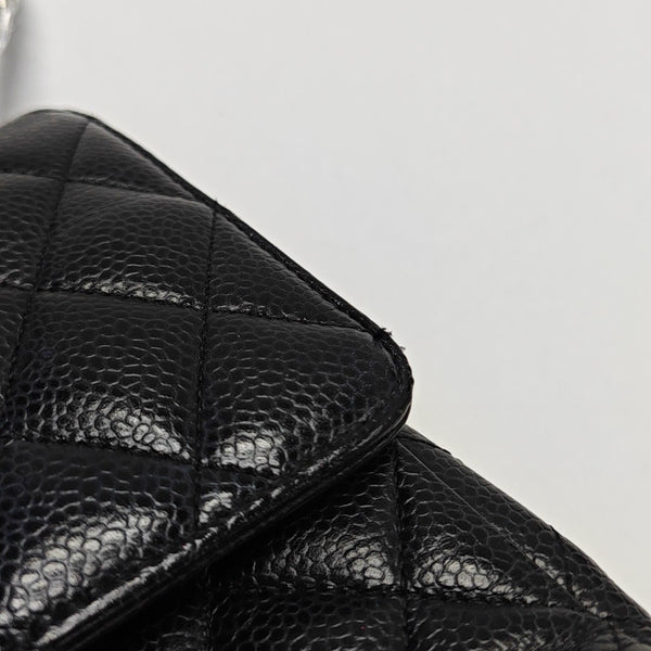 Authenticated pre-owned  CLASSIC FLAP Medium Quilted Grained Calfskin Black - Crossbody Bag at Looply
