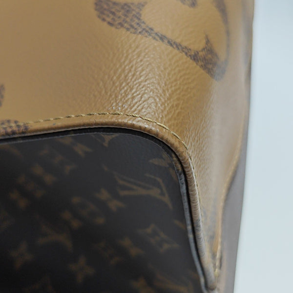 Authenticated pre-owned  ONTHEGO GM Monogram Coated Canvas Brown - Tote Bag at Looply