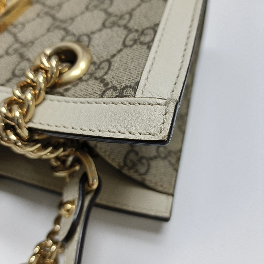 Padlock Small Monogram Coated Canvas Beige