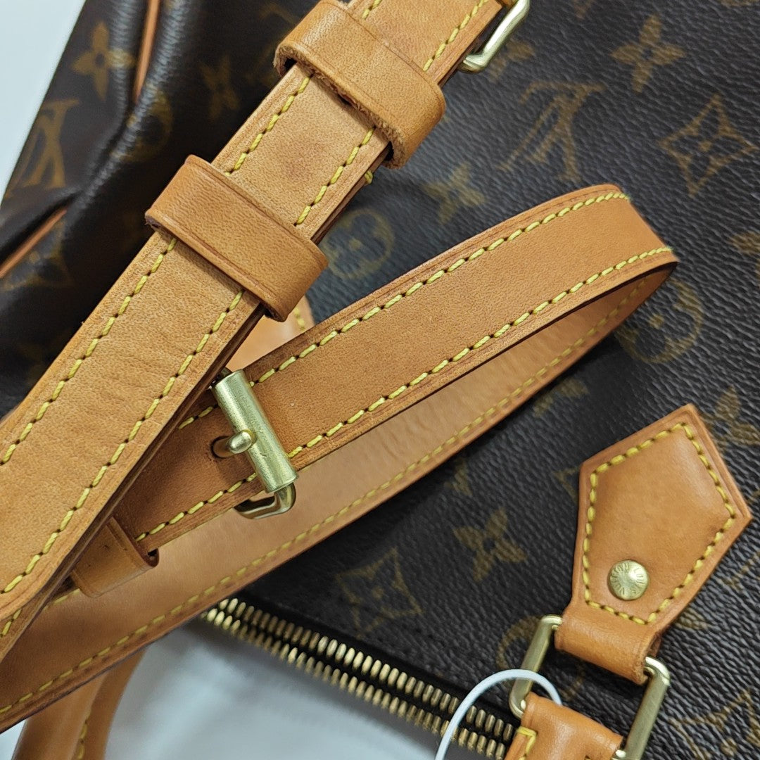 SPEEDY 25 Monogram Coated Canvas Brown
