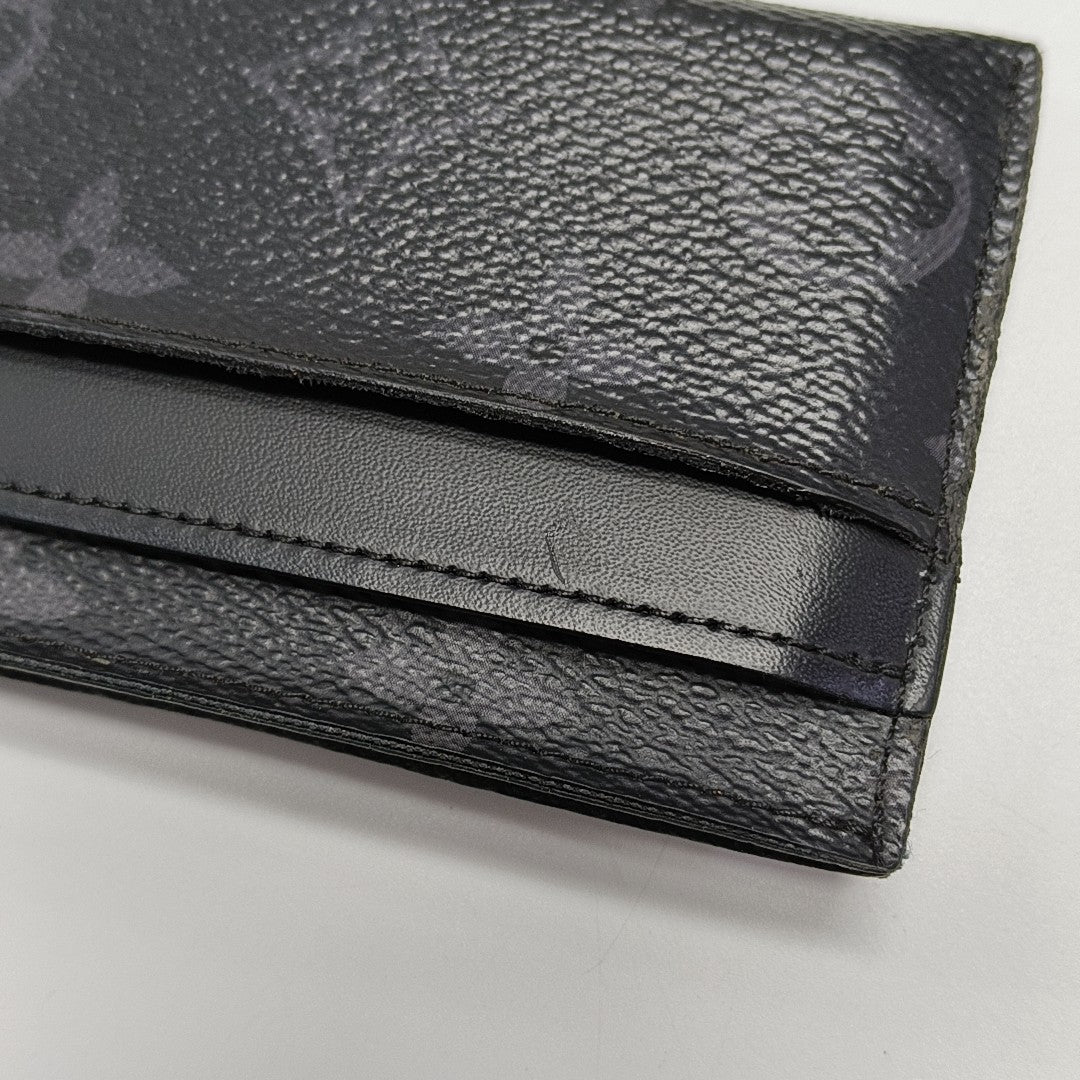 Monogram Coated Canvas Clutch Black