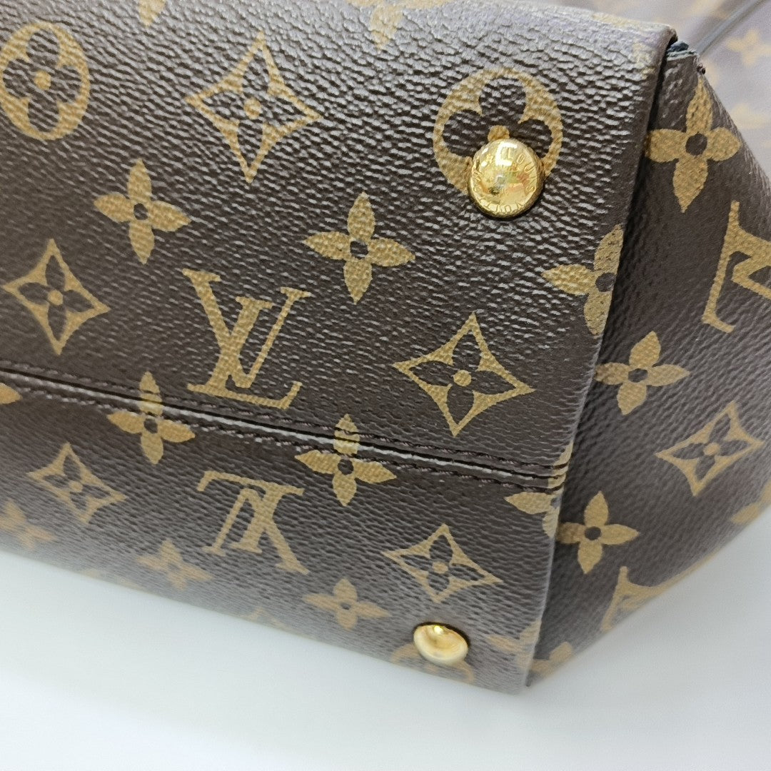 TOURNELLE MM Monogram Coated Canvas Brown