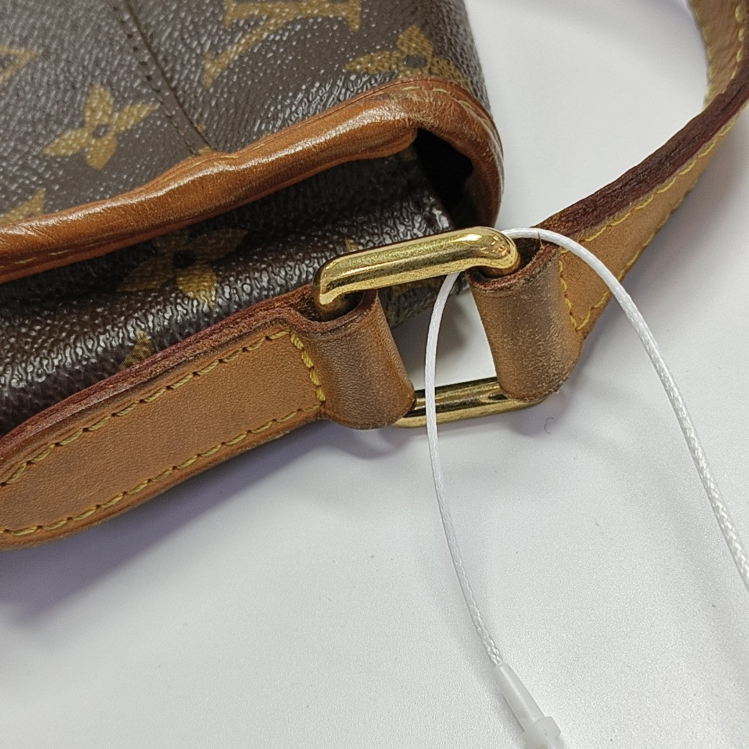 MENILMONTANT PM Monogram Coated Canvas Brown
