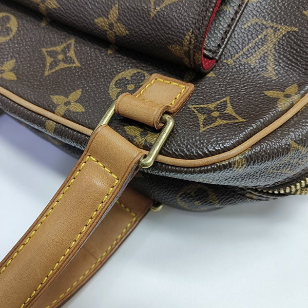 EXCENTRI-CITE Monogram Coated Canvas Brown
