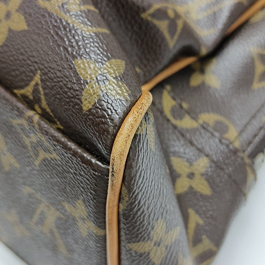 MANHATTAN GM Monogram Coated Canvas Brown