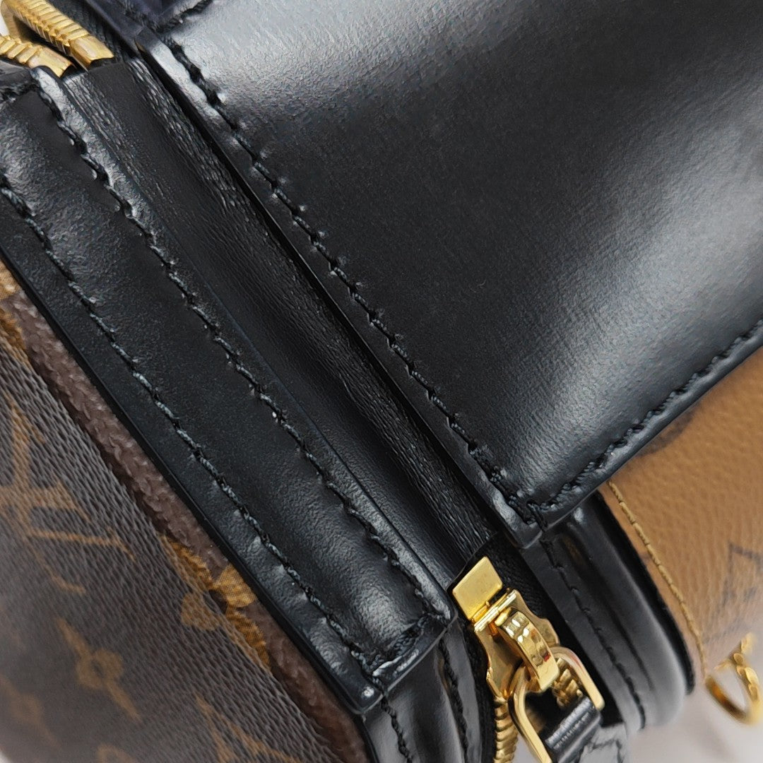CANNES PM Monogram Coated Canvas Brown