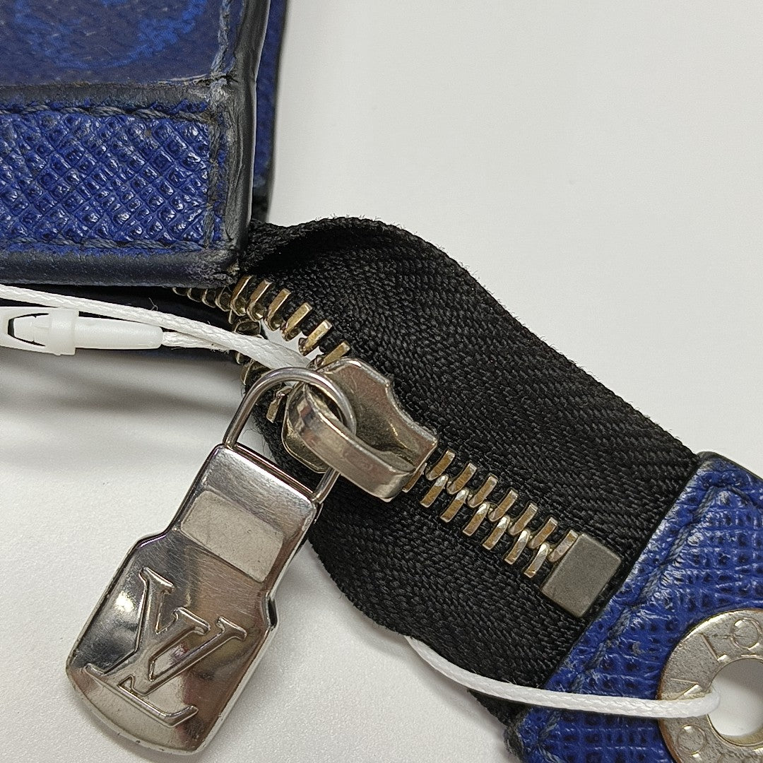Pochette Voyag MM Monogram Coated Canvas Blue