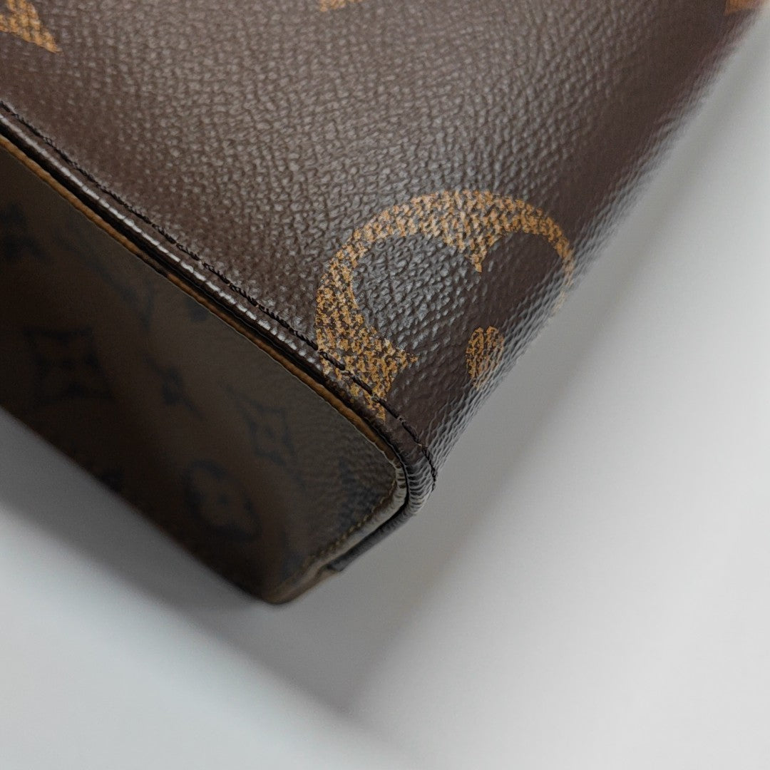 ONTHEGO PM Monogram Coated Canvas Brown