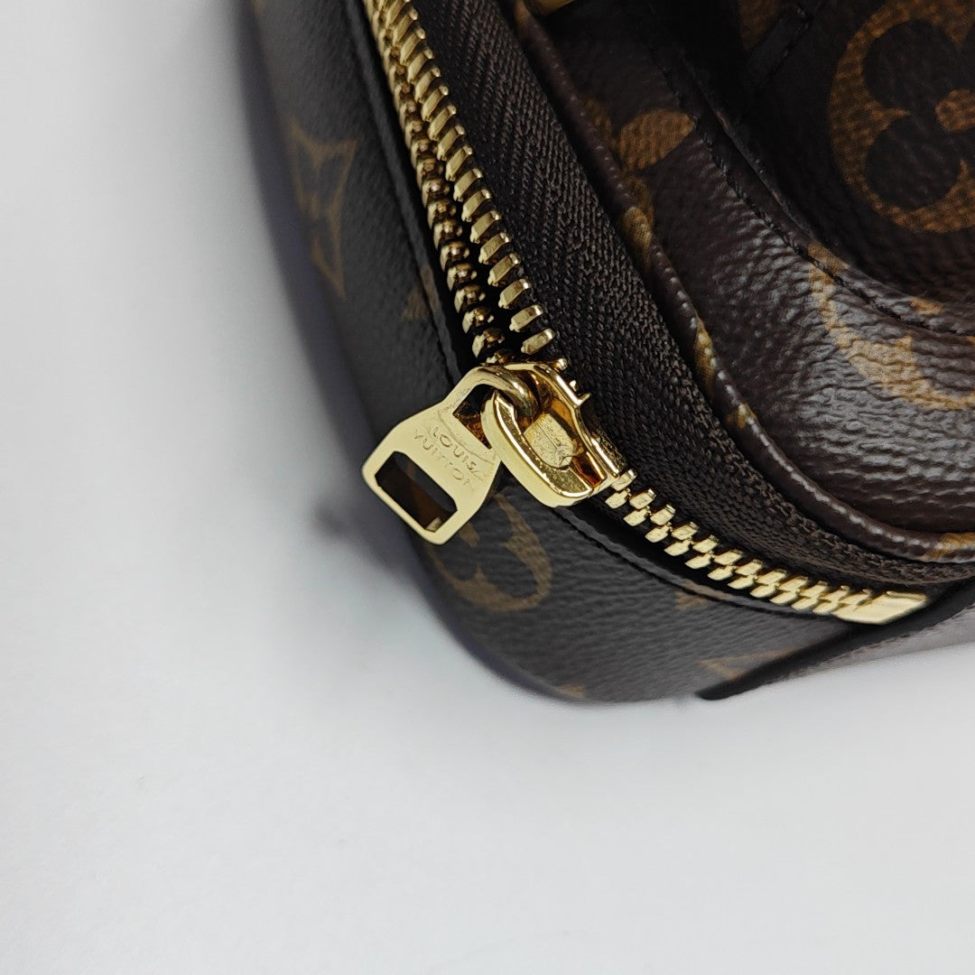 UTILITY Monogram Coated Canvas Brown
