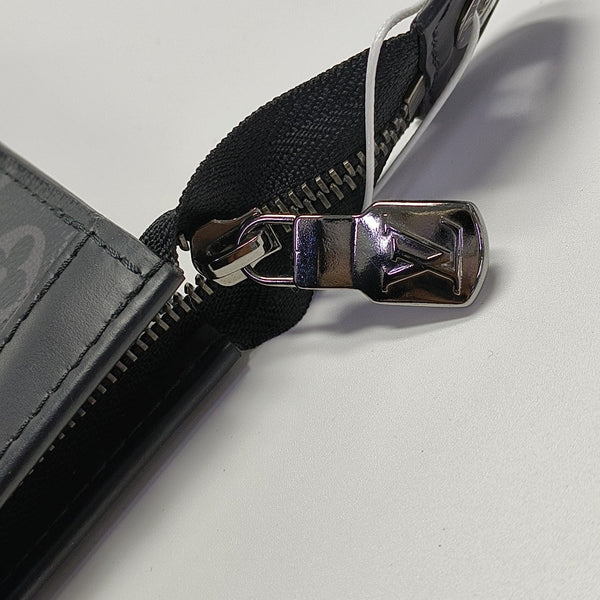 Pochette Voyag MM Monogram Coated Canvas Black