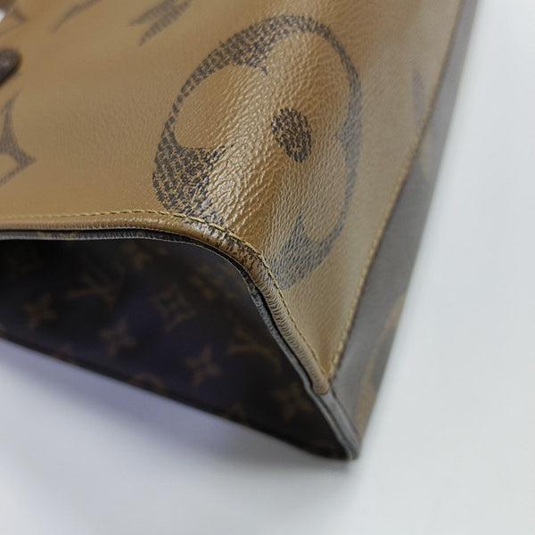 ONTHEGO MM Monogram Coated Canvas Brown