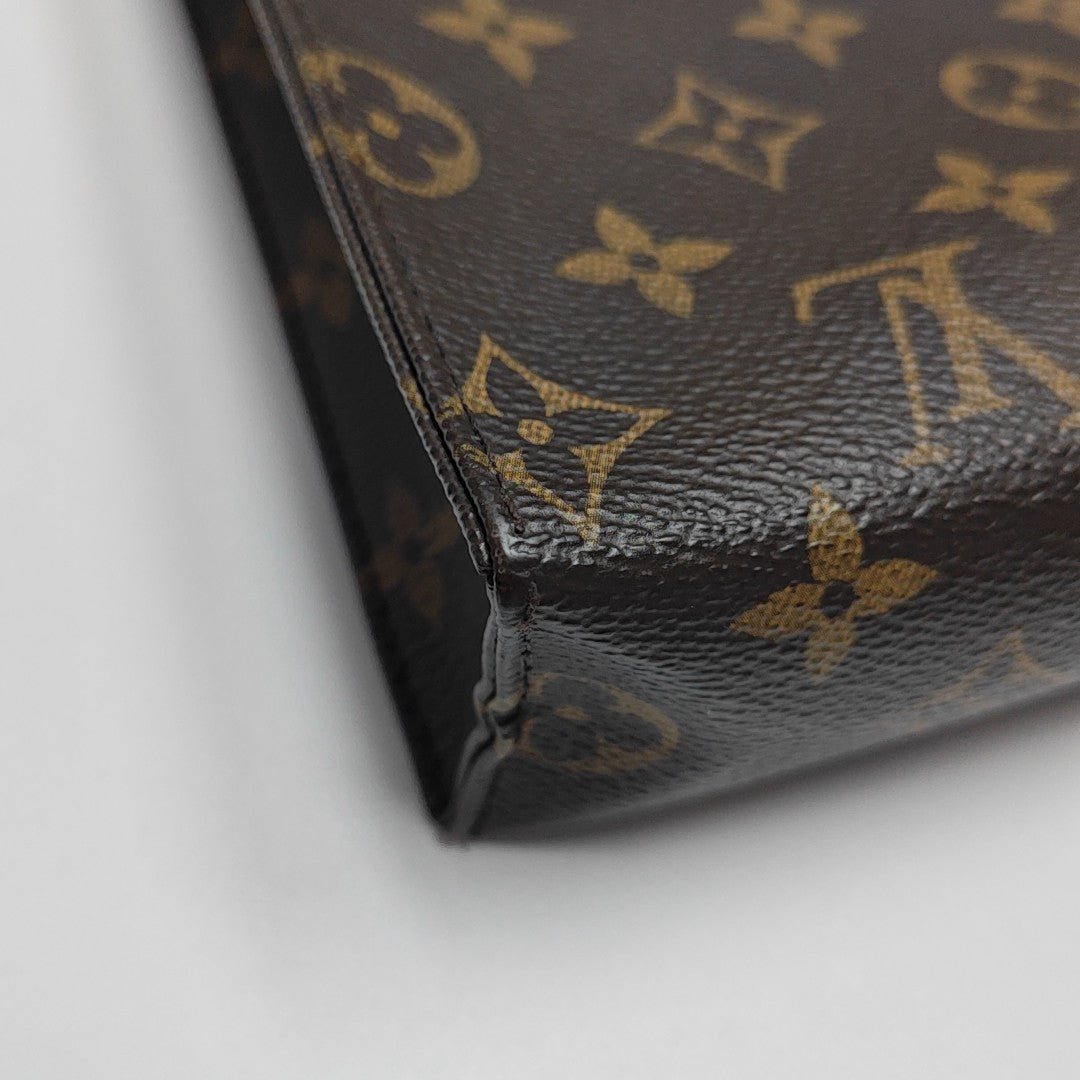 TOILET POCKET 26 Monogram Coated Canvas Brown