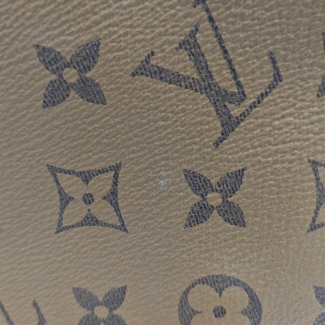 ONTHEGO MM Monogram Coated Canvas Brown