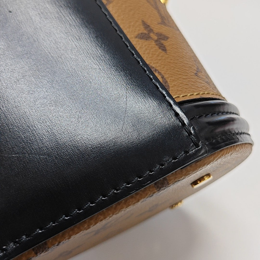 CANNES PM Monogram Coated Canvas Brown