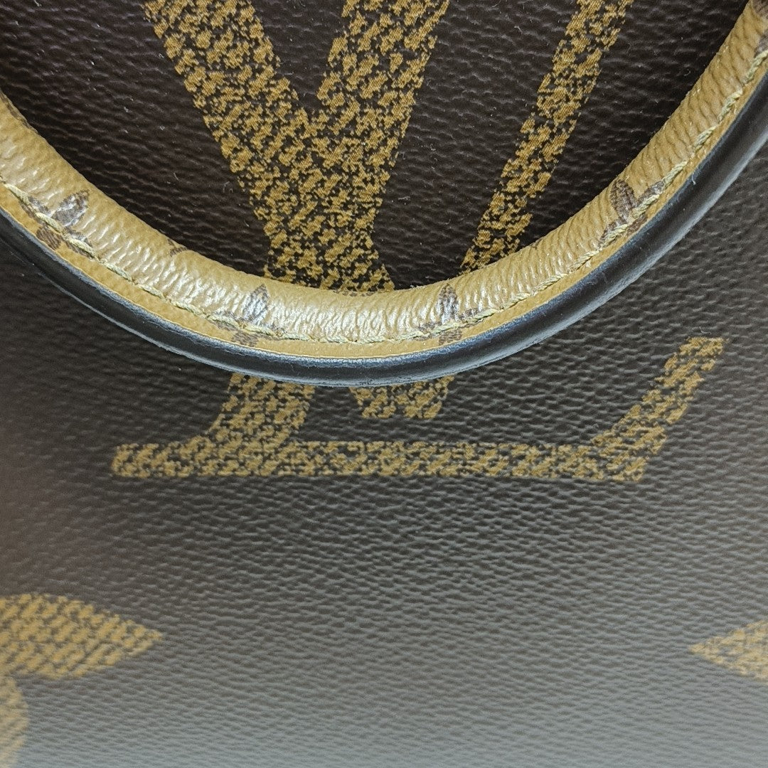 ONTHEGO MM Monogram Coated Canvas Brown