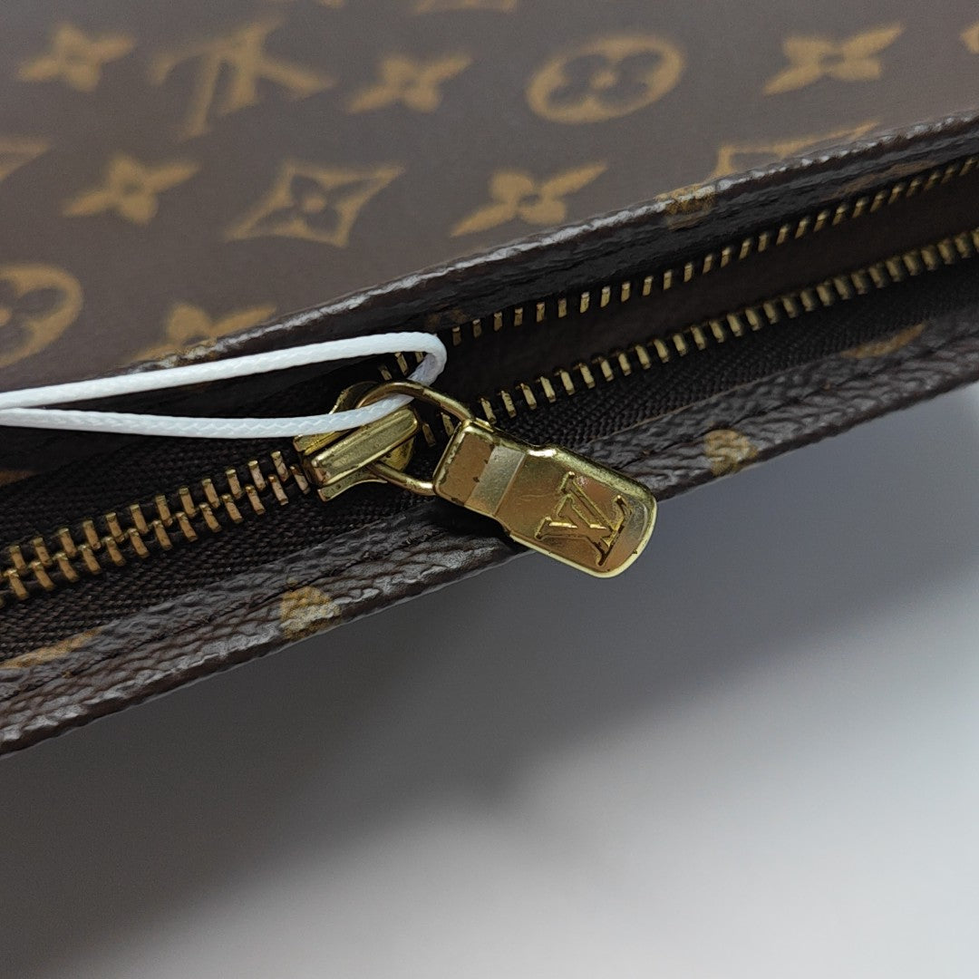 TOILET POCKET 26 Monogram Coated Canvas Brown