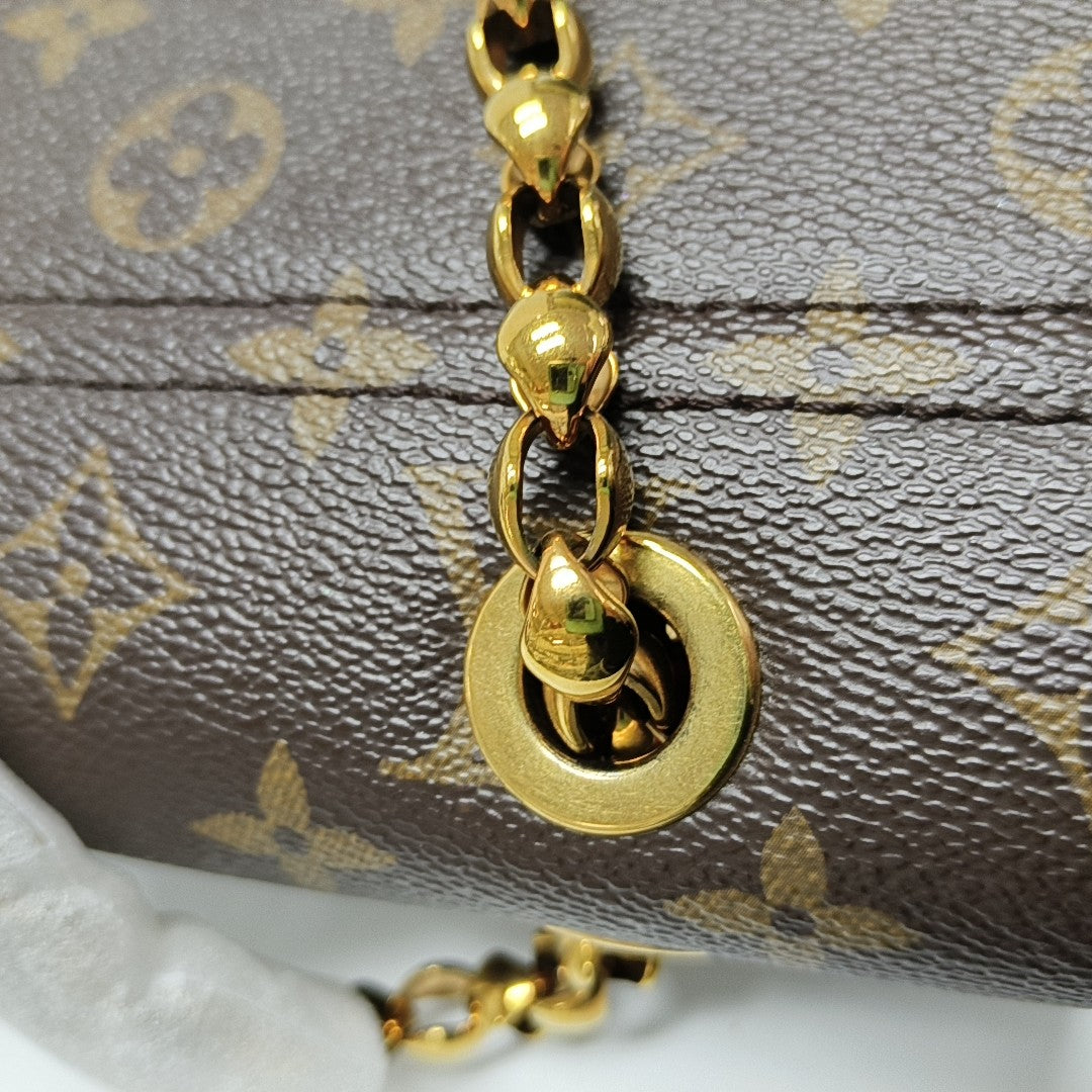 VICTOIRE Monogram Coated Canvas Brown