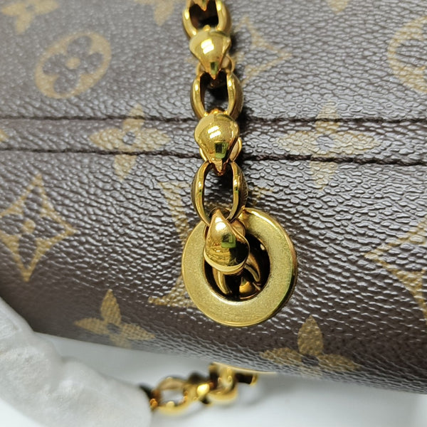 VICTOIRE Monogram Coated Canvas Brown