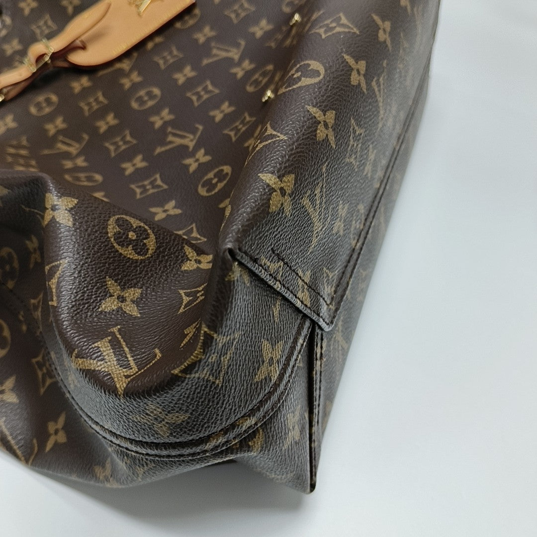 ATLANTIS Monogram Coated Canvas Brown