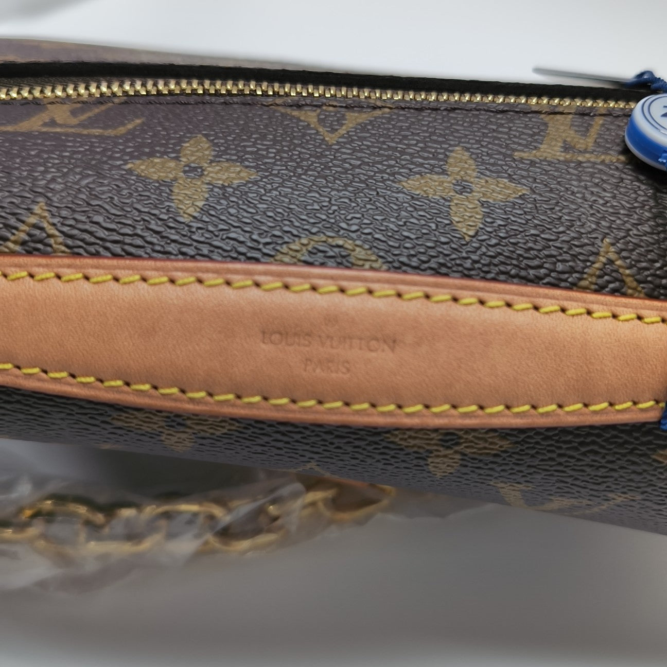 MÉTIS EAST WEST Monogram Coated Canvas Brown
