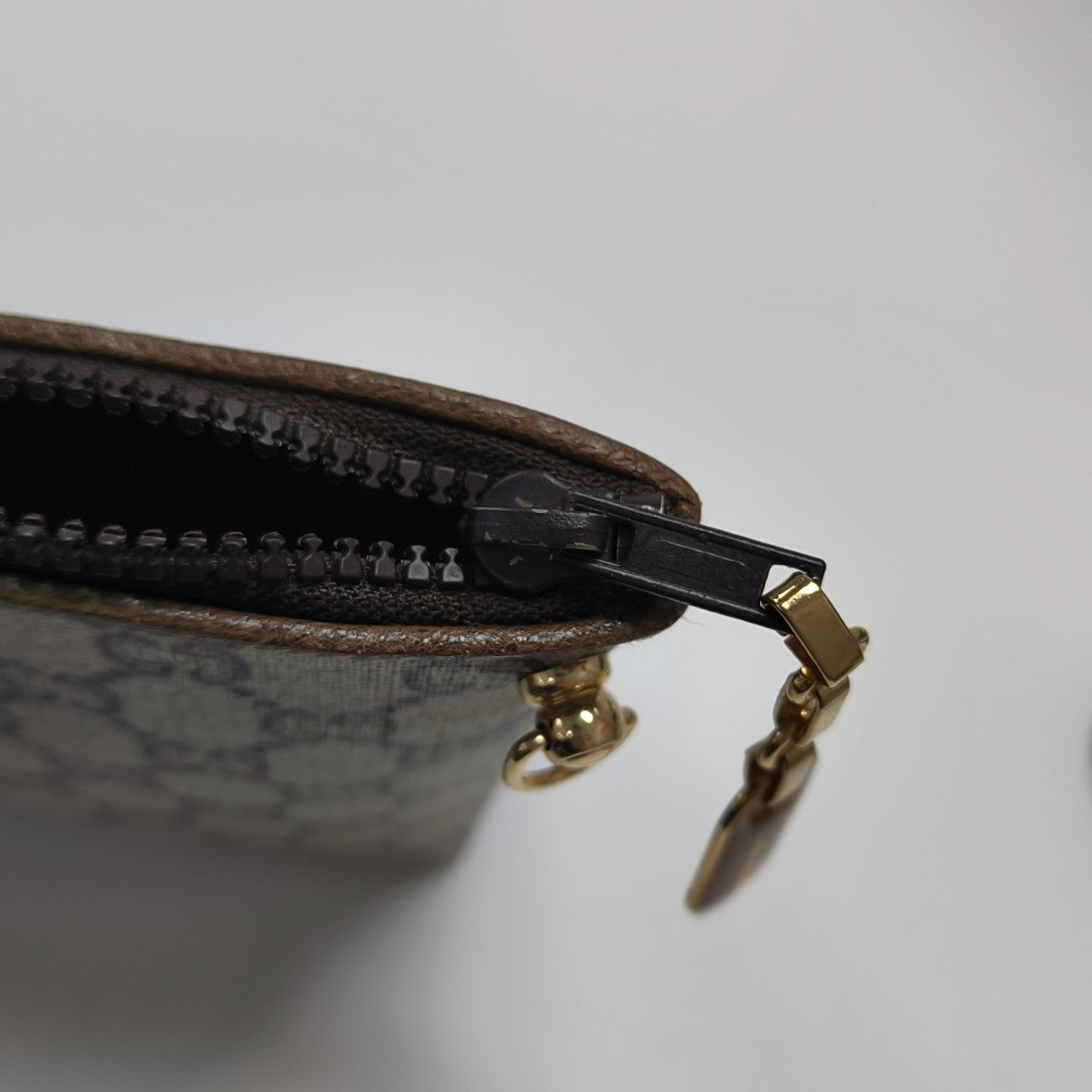 Monogram Coated Canvas Clutch Beige