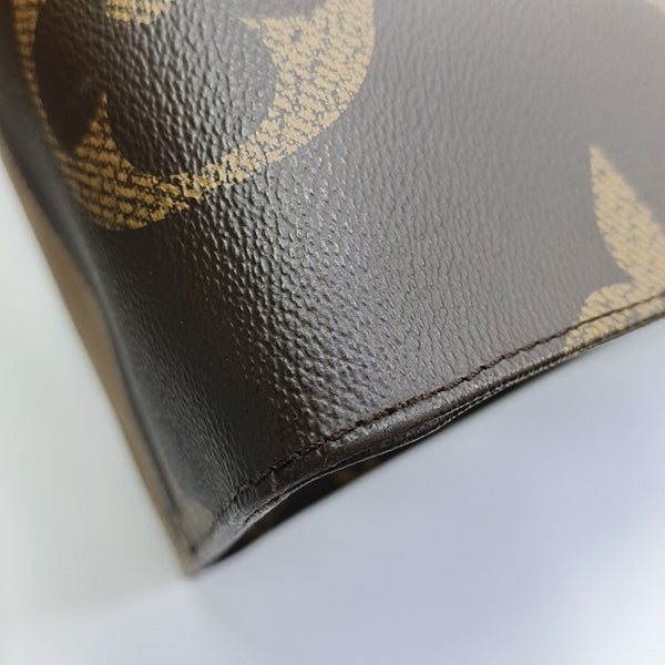 ONTHEGO GM Monogram Coated Canvas Brown