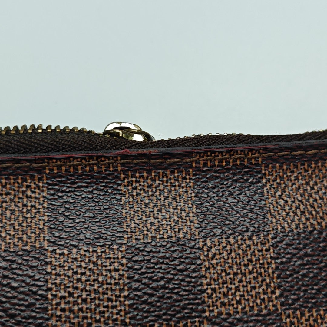Damier Ebene Coated Canvas Clutch Brown