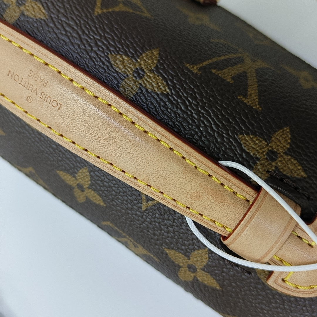 MÉTIS EAST WEST Monogram Coated Canvas Brown