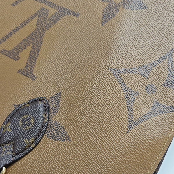 ONTHEGO MM Monogram Coated Canvas Brown