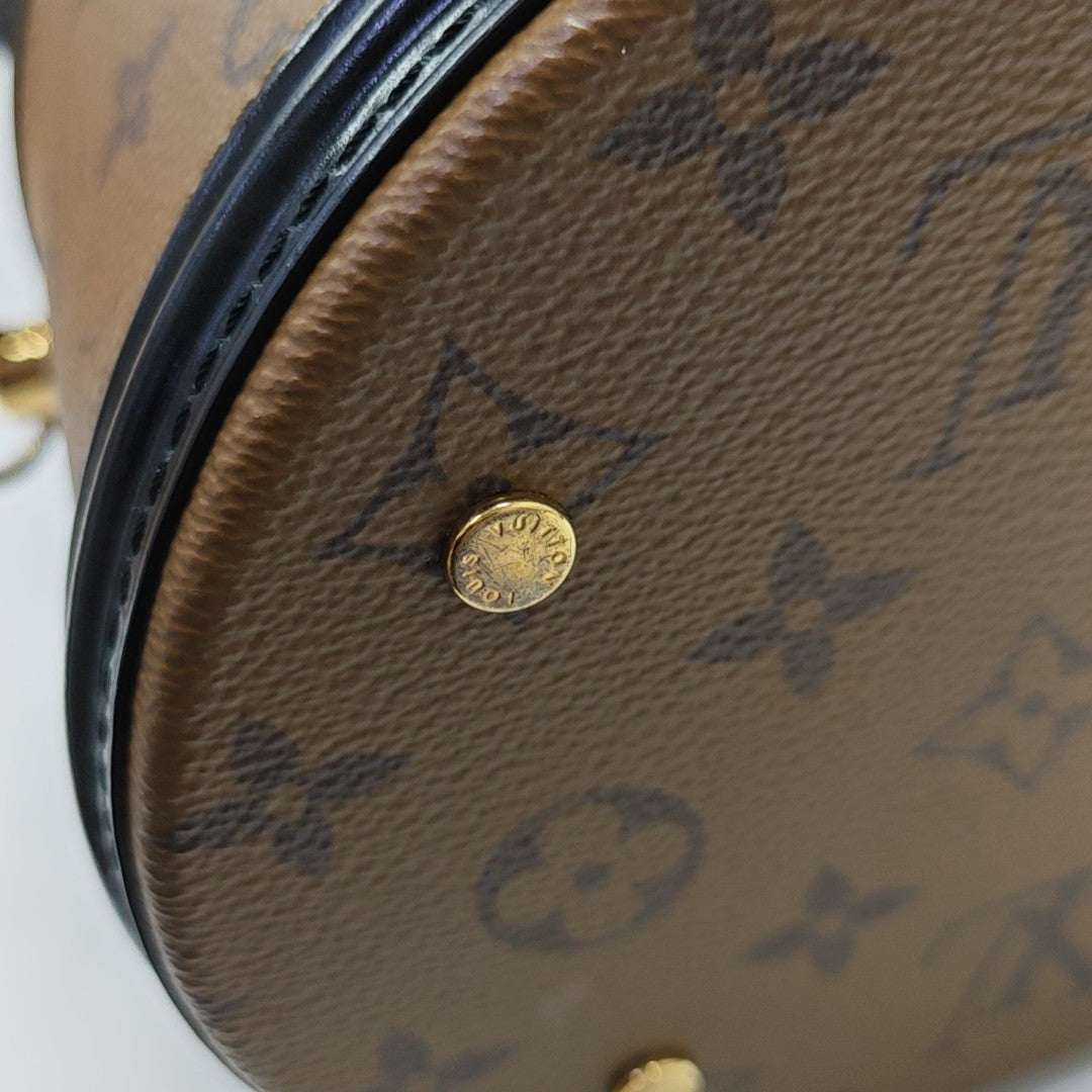 CANNES PM Monogram Coated Canvas Brown