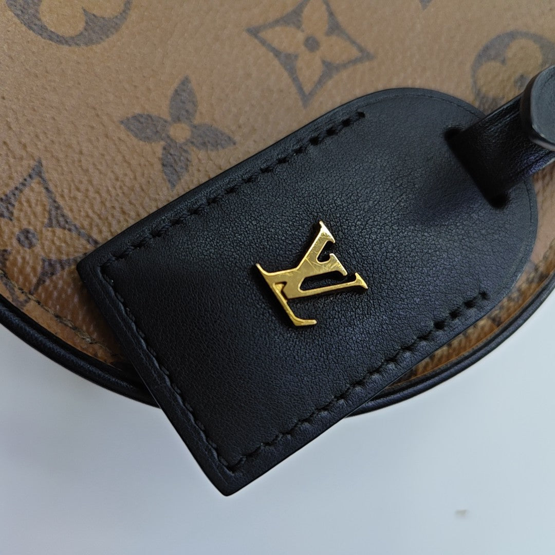 BOITE CHAPEAU Mini Monogram Coated Canvas Brown
